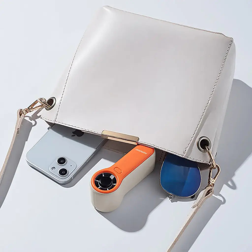 Porodo Lifestyle Pocket Size Handheld Fan - White/Orange